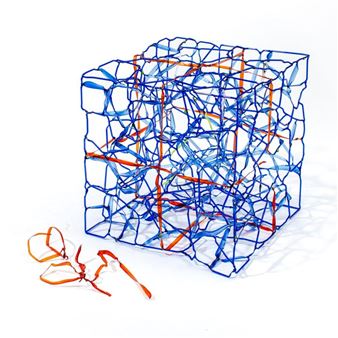 A tangled wire sculpture forming a cube with loose strands nearby.