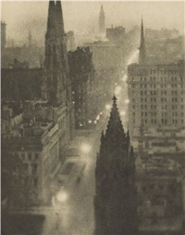 A grainy, atmospheric cityscape featuring a central spire and distant streetlights.