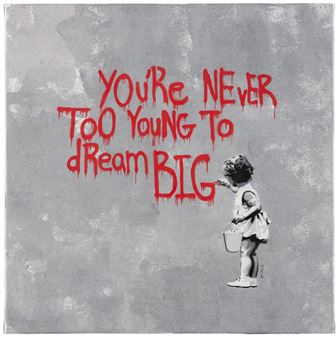 A child stands holding a bucket next to bold red graffiti text on a textured gray background.