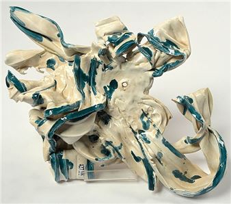 A sculptural ceramic piece with a chaotic, organic form and contrasting teal glaze.