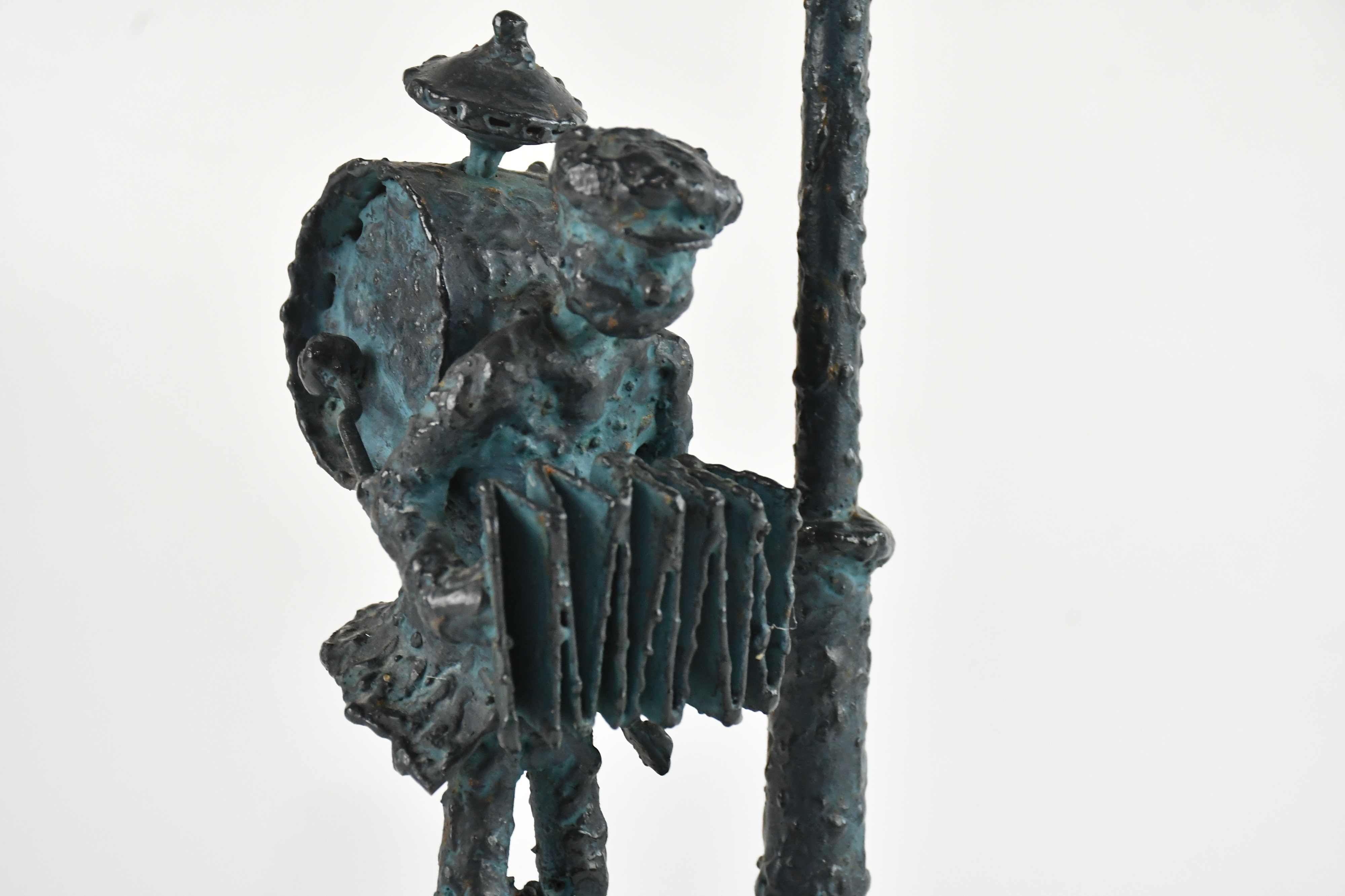 Allen Curran | bronze figure, one man band under street lamp | MutualArt
