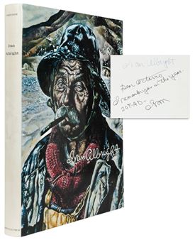 A signed book cover featuring a rugged, weathered figure in a hat against a mountainous backdrop.