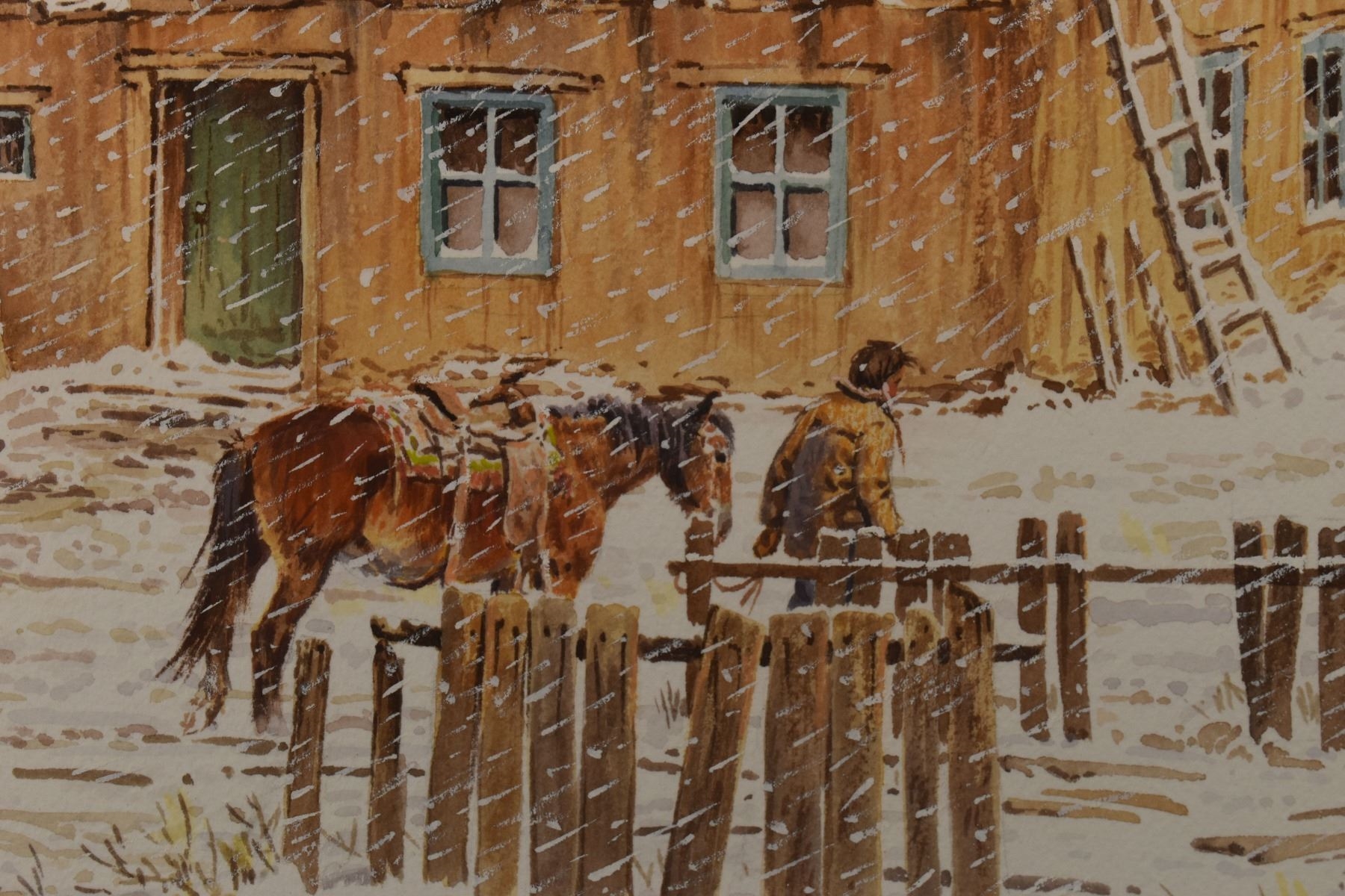 A wintry rural scene featuring a rustic building, wooden fences, and horses in the snow.