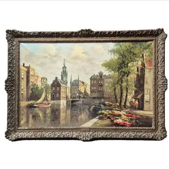 A framed painting of a European canal scene with historic buildings, a sailboat, and vibrant flowerbeds.