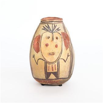 A hand-painted ceramic vase featuring a stylized face with expressive eyes and raised hands.