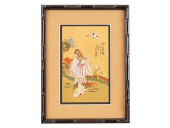 A framed Japanese-style print depicting a figure in traditional robes with a crane and cherry blossoms.