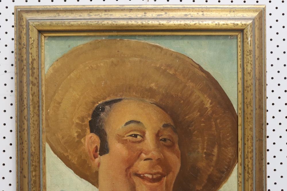 A framed portrait of a smiling man in a sombrero and white shirt against a polka-dotted background.