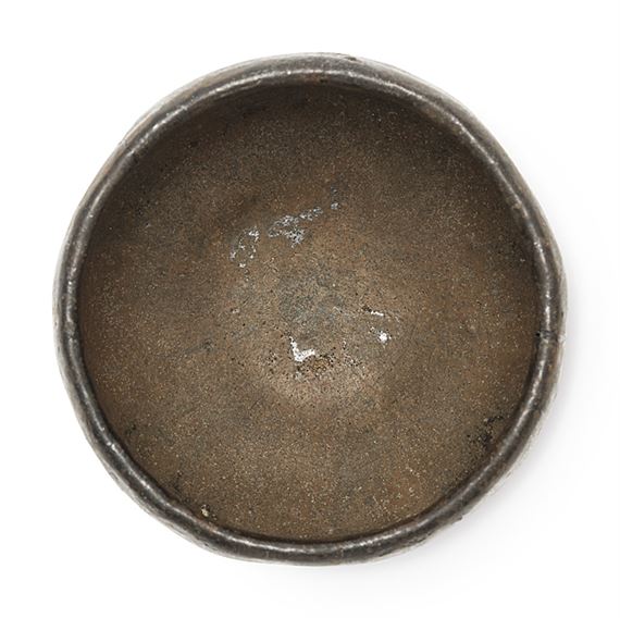 Raku Chojiro | Black tea bowl named Gentaguro (1938) | MutualArt
