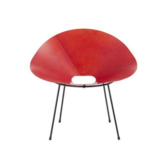 A bold red chair with a curved shell seat and thin black legs.