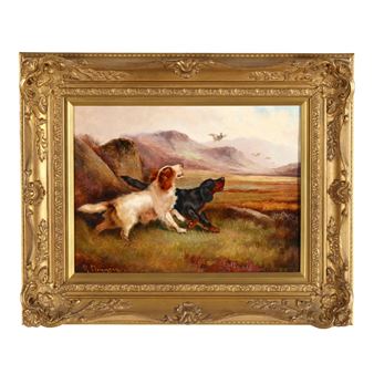 A framed oil painting of two dogs in a rugged landscape.
