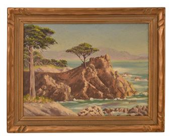 A framed landscape painting of a rugged coastline with rocky cliffs and sea.