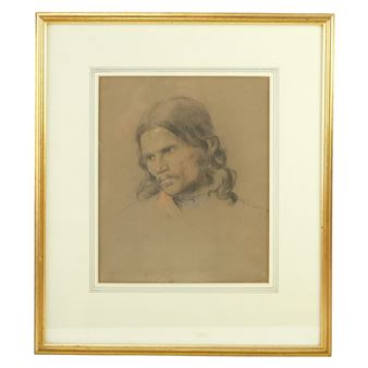 A framed charcoal sketch of a figure with long hair and a contemplative expression.