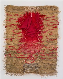 A mixed-media textile piece featuring a central red fabric element surrounded by red stitching on a burlap background.