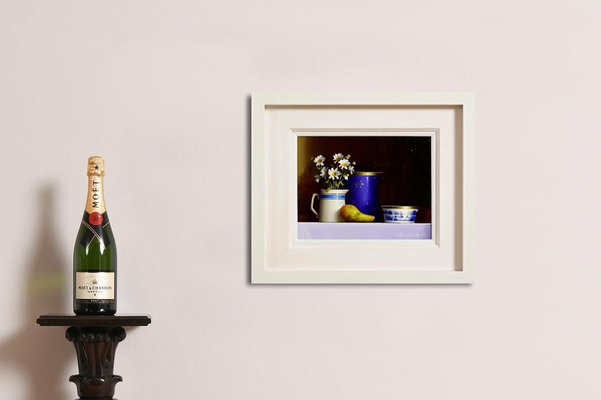 A still life painting featuring a white pitcher with daisies, a blue vase, a pear, and a small bowl against a dark background.