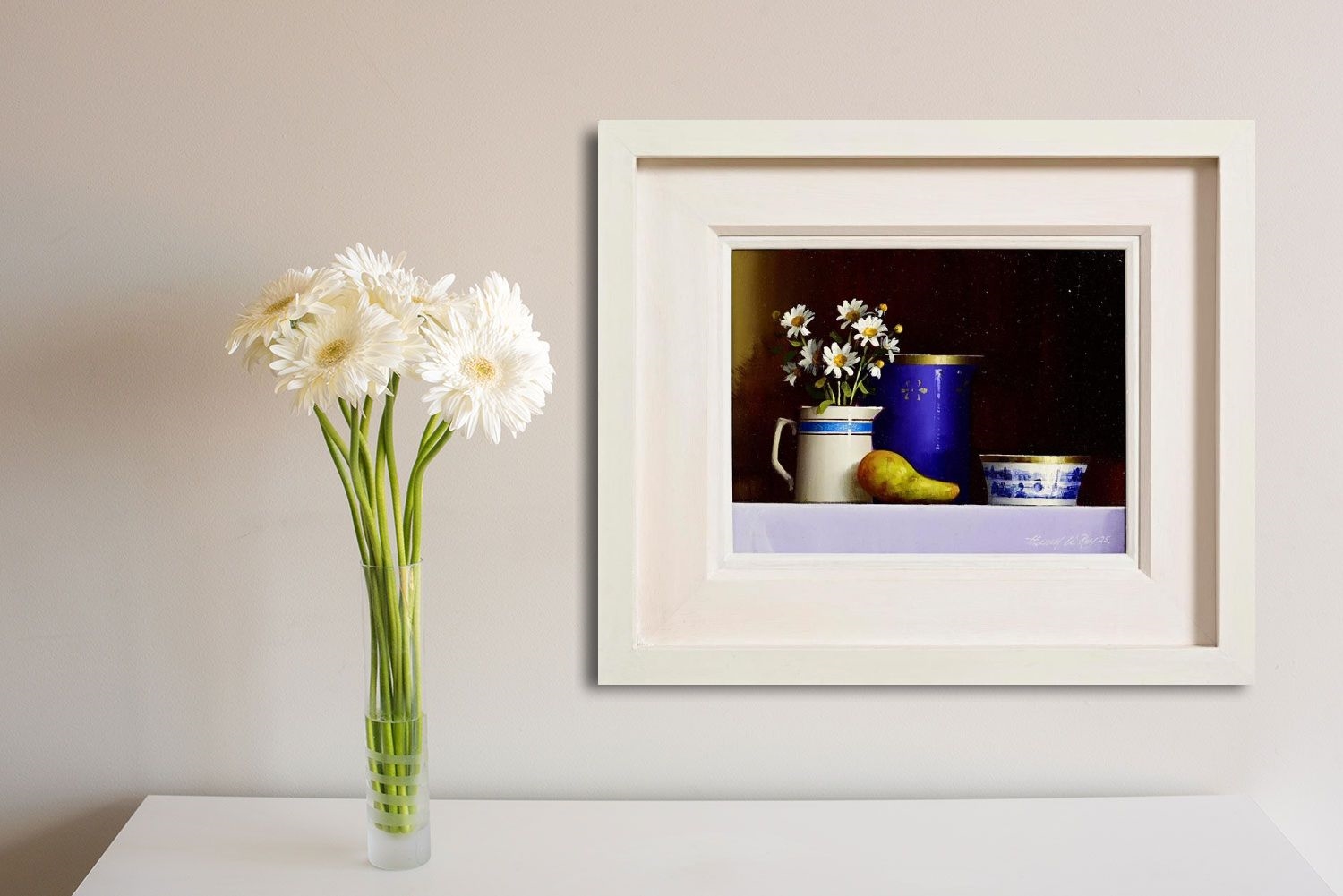 A still life painting featuring a white pitcher with daisies, a blue vase, a pear, and a small bowl against a dark background.