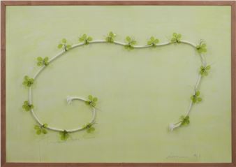 A minimalist artwork featuring a white vine-like spiral adorned with small green leaves against a pale yellow background.