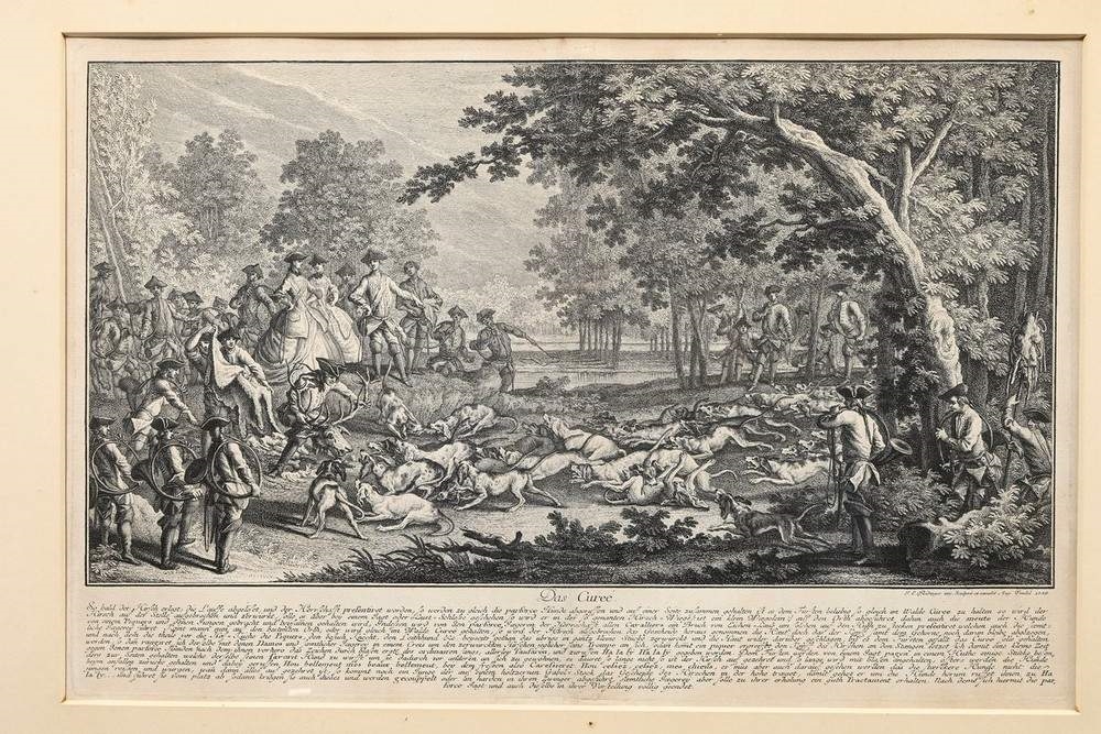 A set of four framed black-and-white etchings depicting forest scenes with figures.