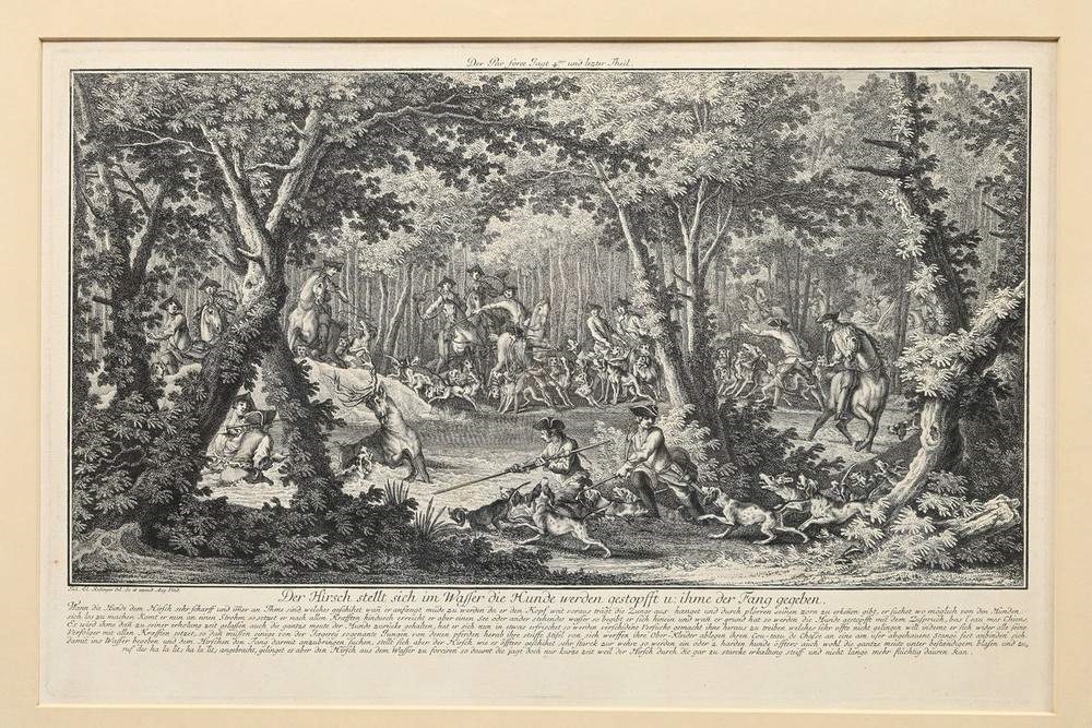 A set of four framed black-and-white etchings depicting forest scenes with figures.