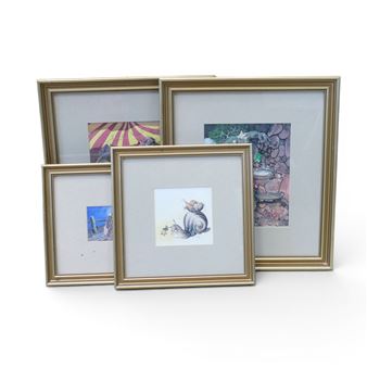 A collection of four framed animal illustrations arranged in a two-by-two grid.