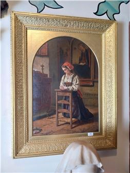 A framed painting of a woman at a desk with a mirror reflection in the background.