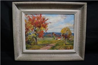 A framed landscape painting of an autumnal countryside scene.