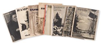A fanned arrangement of vintage travel notebooks featuring black-and-white photography and bold typography.