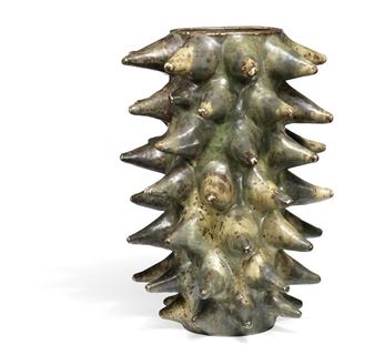 A large stoneware vase modelled in sprouting style