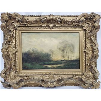 A landscape painting in an ornate gilded frame.
