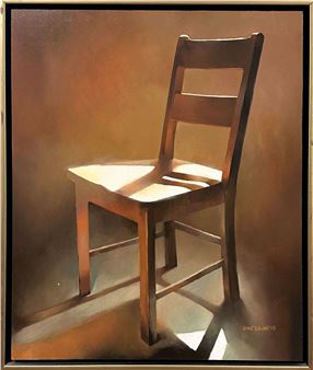 A wooden chair bathed in dramatic sunlight against a warm, abstract background.