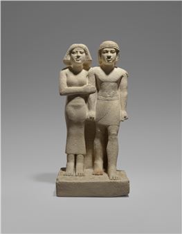 AN EGYPTIAN LIMESTONE PAIR STATUE OF THE ROYAL ACQUAINTANCES NEBEFWY AND MES-SAT
