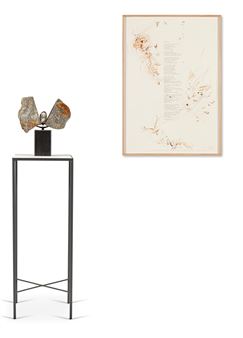 A minimalist interior scene featuring a sculptural display and a framed botanical print.