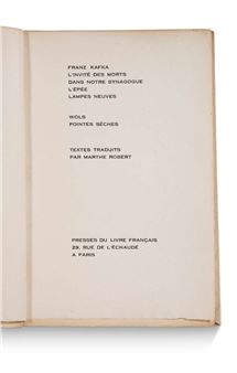 A minimalist book page with centered black text on aged cream paper.