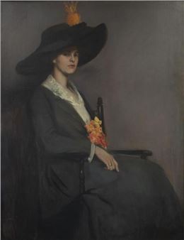 A formal portrait of a seated woman in dark clothing and a wide-brimmed hat, holding a bouquet of flowers.