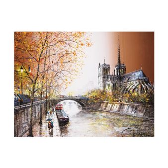 A rainy autumn scene along a riverbank with a large cathedral in the distance.
