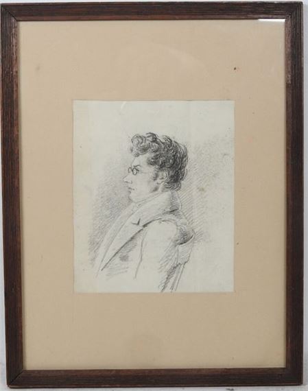 A framed charcoal sketch of a person in profile.