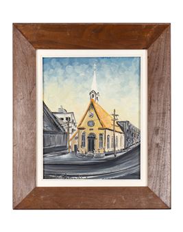 A framed watercolor painting of a yellow church on a quiet street corner.