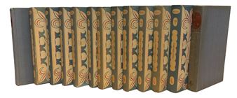 A row of ten vintage books with patterned spines and a matching cloth-bound case.