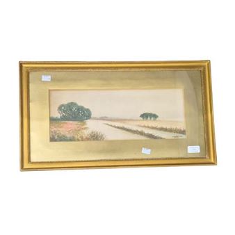 A framed landscape painting depicting a rural road stretching toward distant trees.