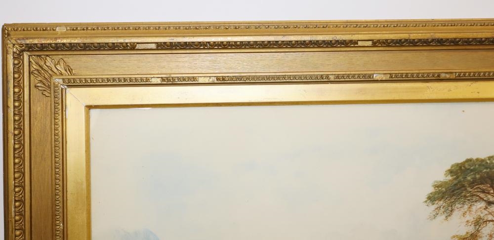 A pair of framed landscape paintings depicting coastal scenes with boats, trees, and distant mountains.