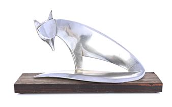 A sleek, metallic fox sculpture posed in a crouching stance on a dark wooden base.