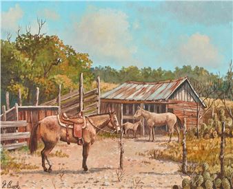 A rustic western scene featuring horses near a weathered barn.
