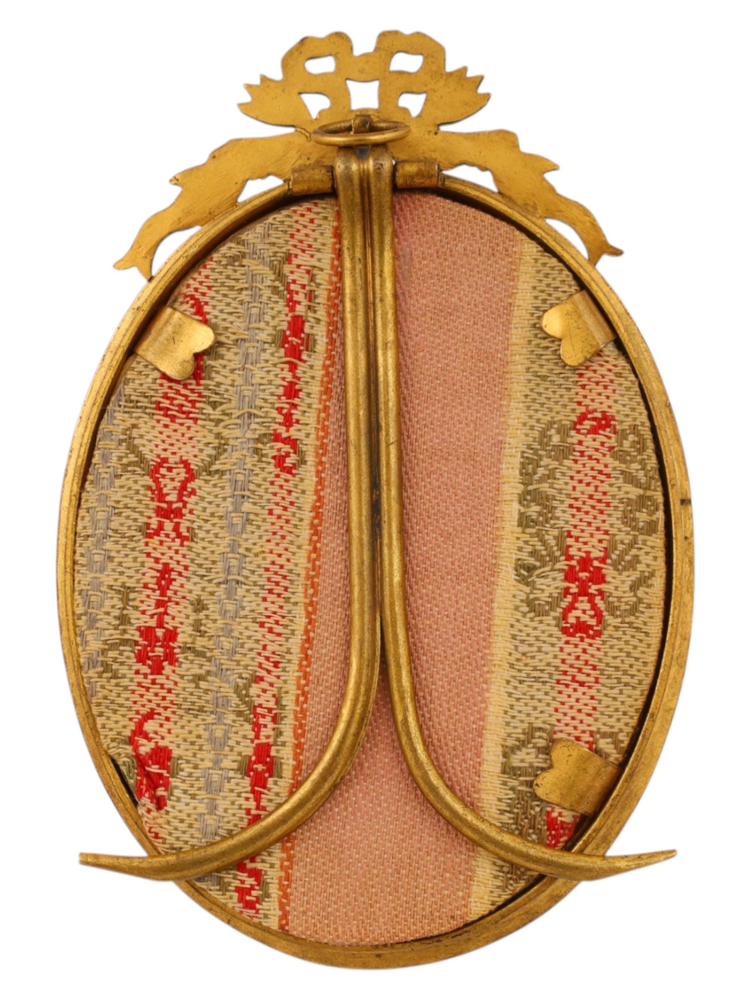 A formal portrait of a man in military uniform within an ornate oval frame.