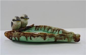 Two Kookaburras on gum leaf figure - Grace Seccombe