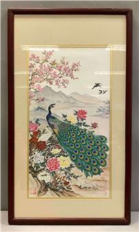 A framed traditional East Asian painting featuring a peacock amidst blossoming flowers and distant mountains.