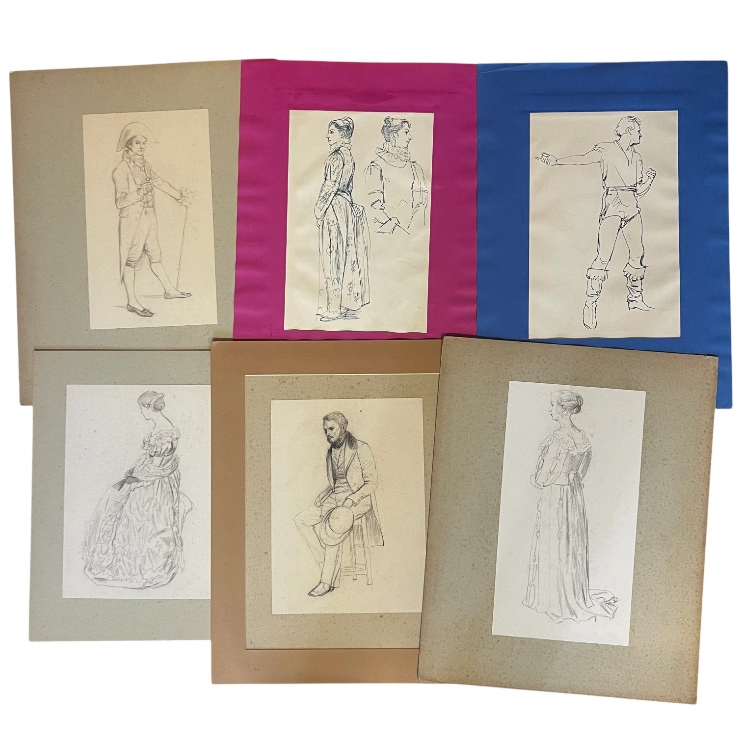 A collection of framed and unframed drawings featuring classical figures, portraits, and a landscape scene.
