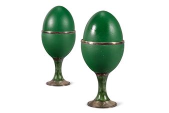 A PAIR OF SILVER AND GREEN ENAMEL MOUNTED EMU EGGS Picture