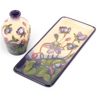 A Moorcroft Hepatica pattern tray, L20cm, and matching vase, H9cm Picture