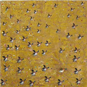 A dense flock of birds in flight over a textured golden background.