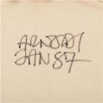 A close-up of a fabric surface with a handwritten signature and date.