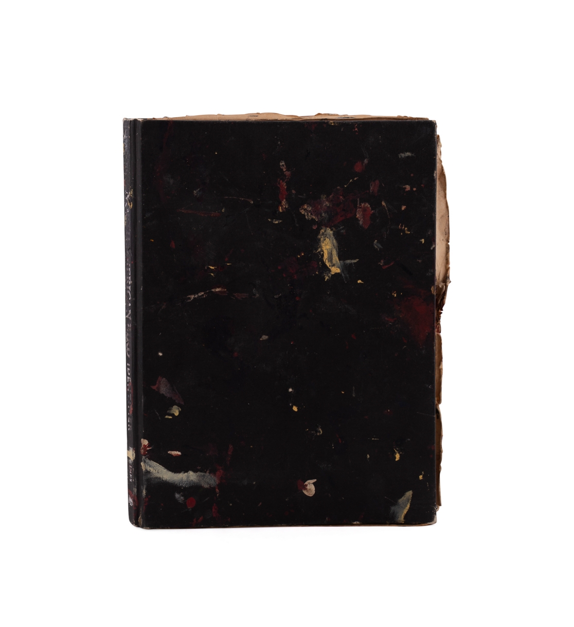 A worn, dark-bound book with visible signs of age and use.